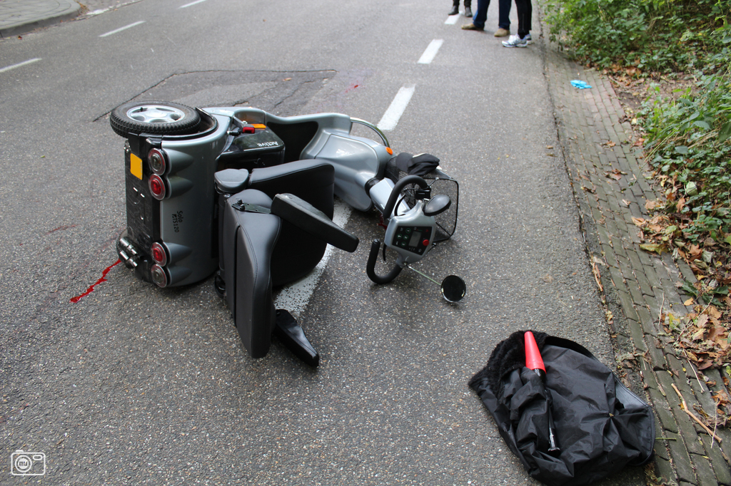 scootmobiel op kant